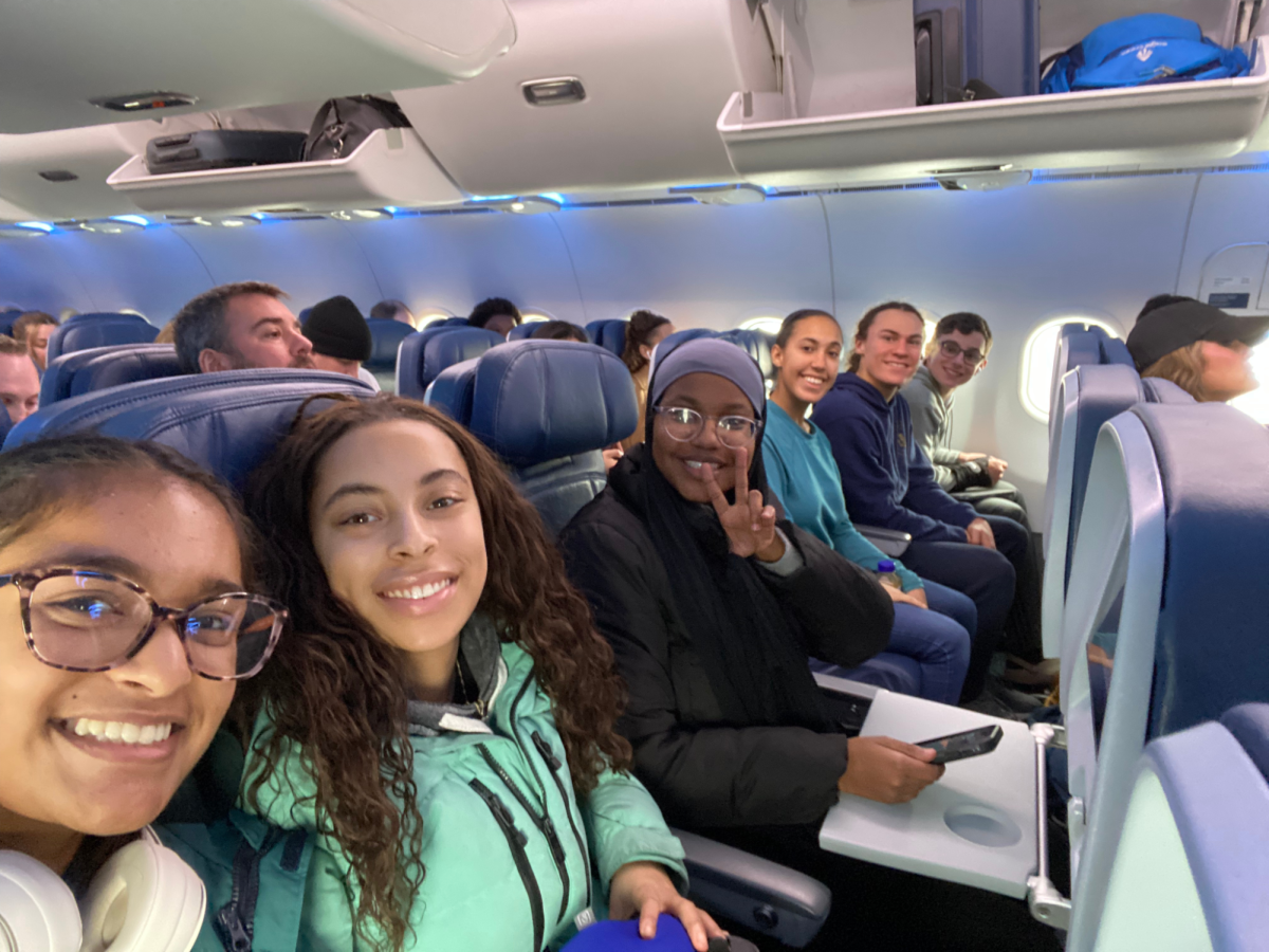 TAKEOFF. (From left to right) Sophomore Nabeeha Qadri, senior Julia Taylor, sophomore Anessa Herzi, senior Raven Glaser, sophomore Langston Thompson and junior James Welsh settle in for the two and a half hour flight to the Washington-Reagan National Airport.