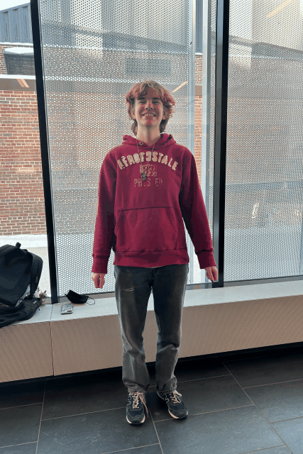NORTHERN LIGHTS. Junior Rowan Moore got ready after their fencing tournament for the dance. 