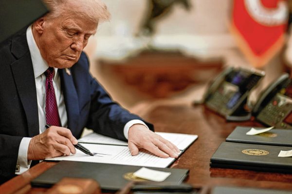 SWIFT SIGNINGS. President Donald Trump signs one of over 20 executive orders during his first day in office. These signings set a record for the most by any president on their inaugural day. A Junior, Echo Dayton said, "I do not know if this is common, just to start passing all these rules … I think it is an abuse of power."

Cite: @White House on X, Public Domain, January 20, 2025
