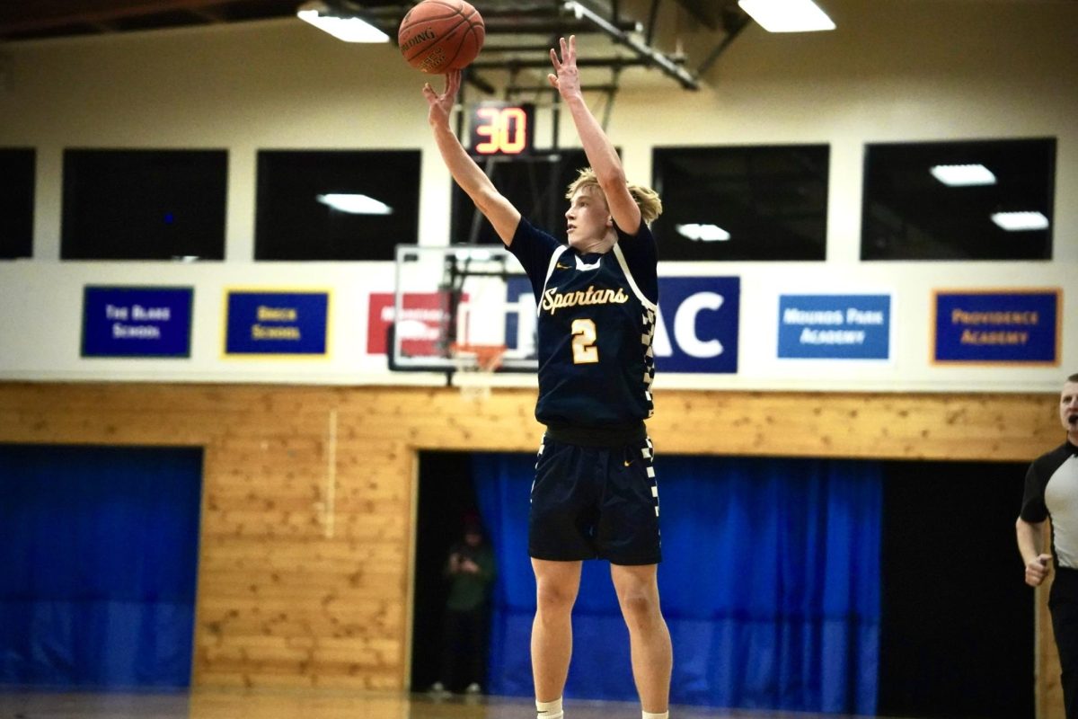 TAKE THE SHOT. Junior Ben Sieben takes the shot with no defenders on him.