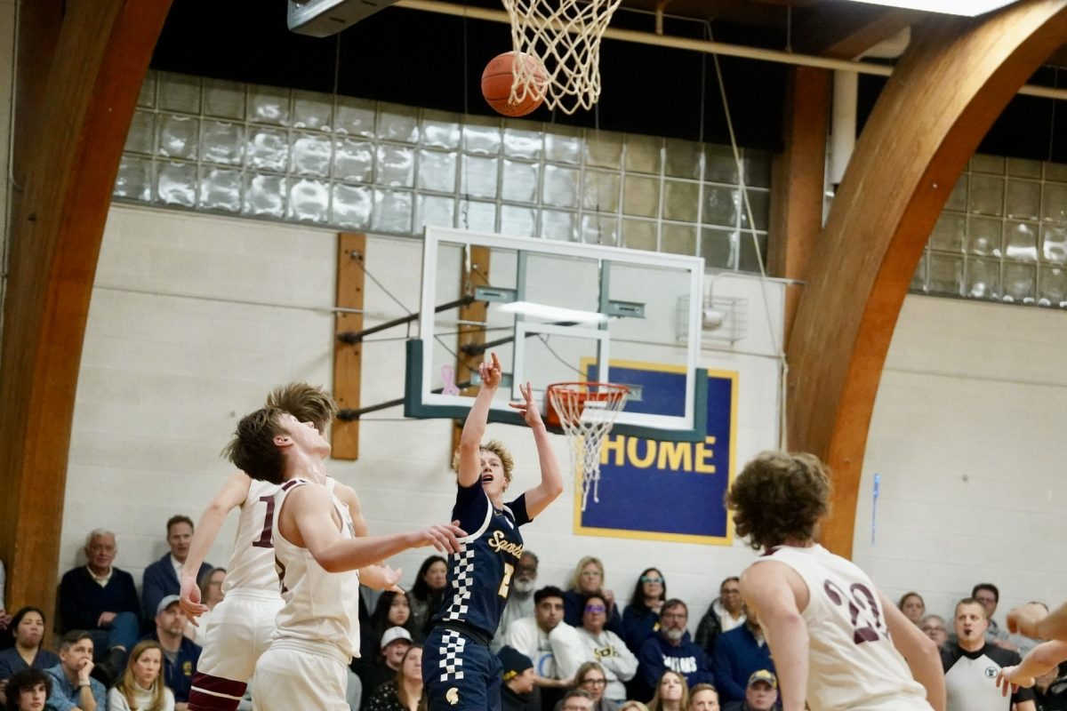 AIM. Junior Ben Sieben shoots a jumper after dropping his defender. 