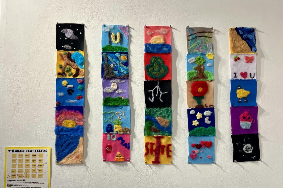 FELTED FUN. This display of seventh-grade flat felting projects pops out in a bright, colorful and playful way.

