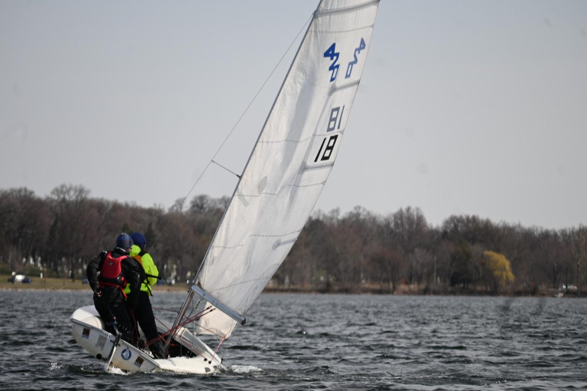 DANGEROUS WATERS. The sailors must learn to navigate all types of obstacles, including difficult weather conditions like harsh wind or waves. This sailing duo stands up, balancing their boat to avoid tipping over. 