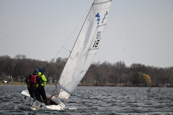 DANGEROUS WATERS. The sailors must learn to navigate all types of obstacles, including difficult weather conditions like harsh wind or waves. This sailing duo stands up, balancing their boat to avoid tipping over. 