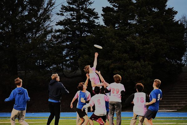 JUMP FOR IT! Captain Jesse Wussler launches into the air, battling gravity for a high-flying disc midair. “Winning the Rookie of the Year Award, freshman year, that's pretty cool,” he said, reflecting on his favorite ultimate frisbee memory. 
