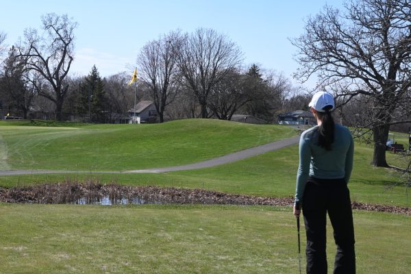 EYES ON THE PRIZE
Captain Peony Steele sets her sights on the next hole, envisioning her shot. “It allows me to get a feel for the shot to visualize my aim and distance with respect to environmental factors,” she commented.
