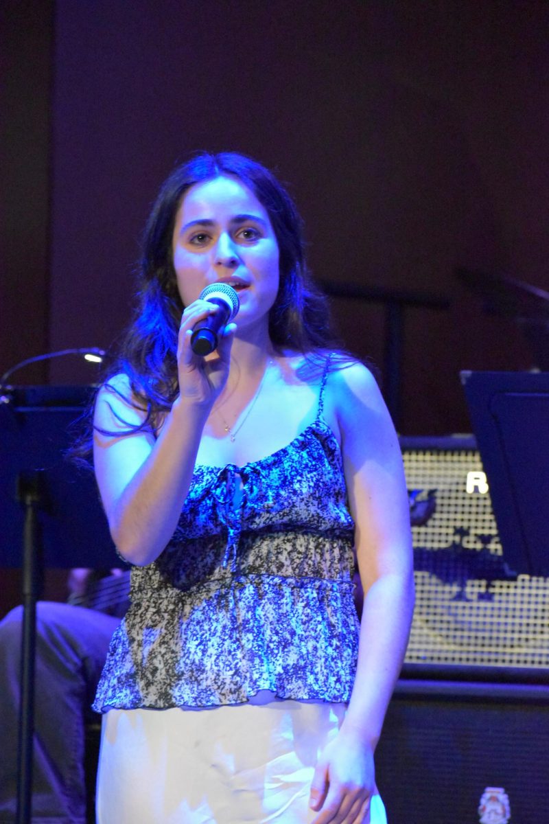 SOARING SOLO. Senior Georgia Ross sings a beautiful rendition of "Everything" by Michael Bublé. This is her third year as a soloist in the cabaret.