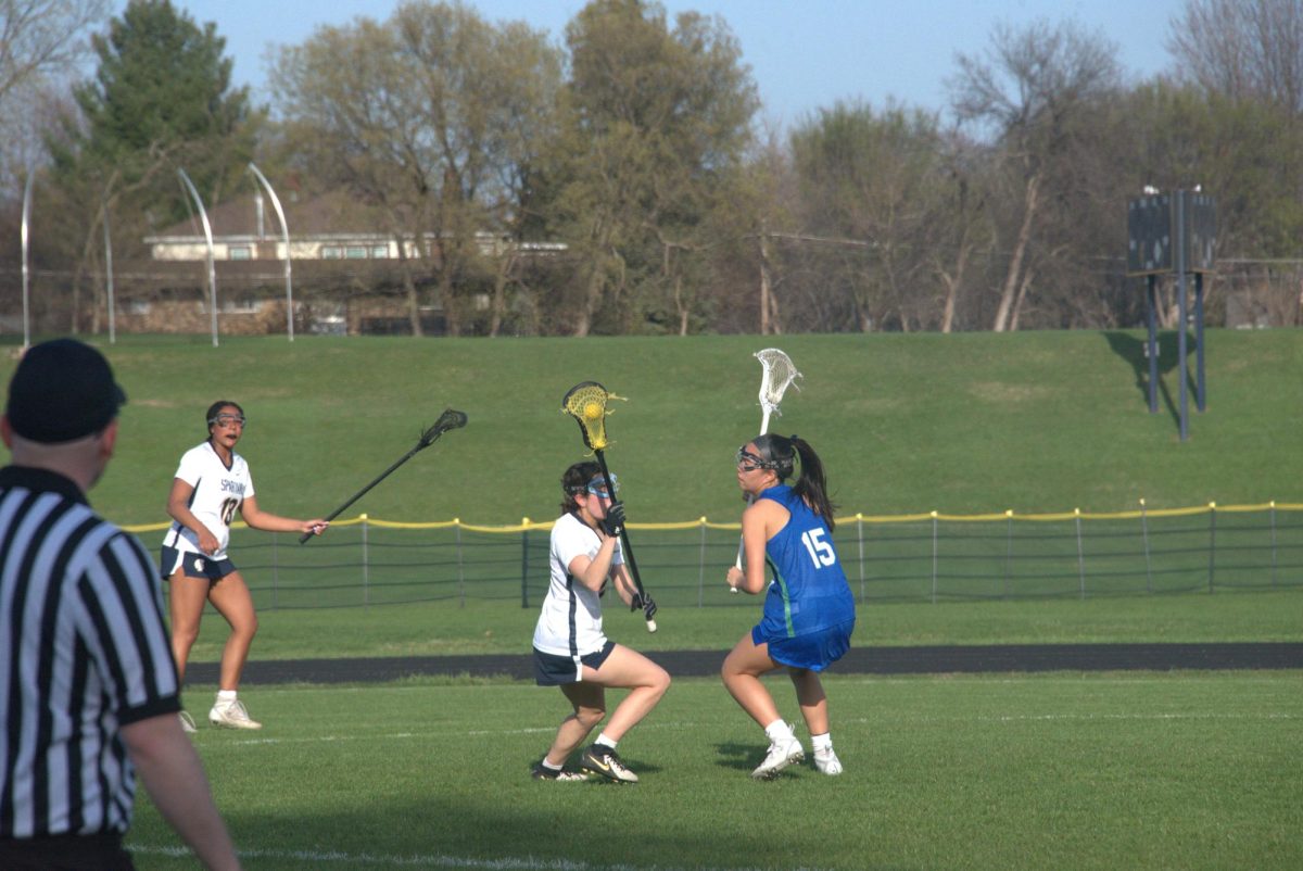 1 ON 1. Junior Dia Chaney takes on a Blake bear 1 on 1 to advance to the goal. 