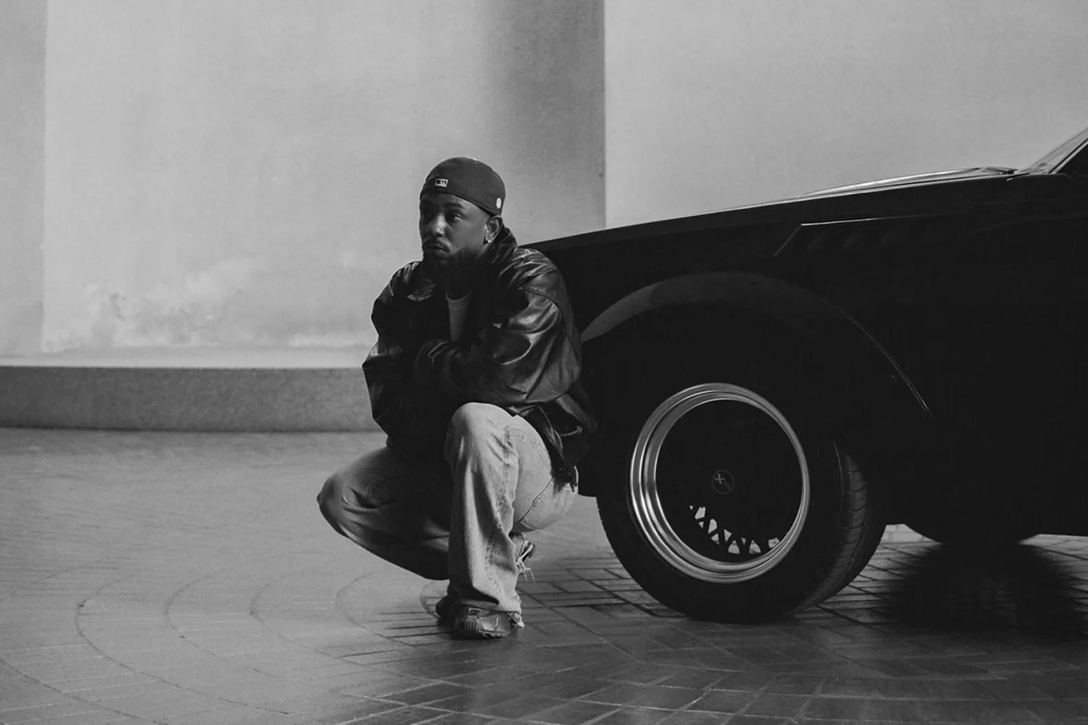 GNX. Lamar poses in front of the Buick GNX, the car which was the namesake of his last album and featured heavily in his Superbowl LIX (Image credit: Pglang)