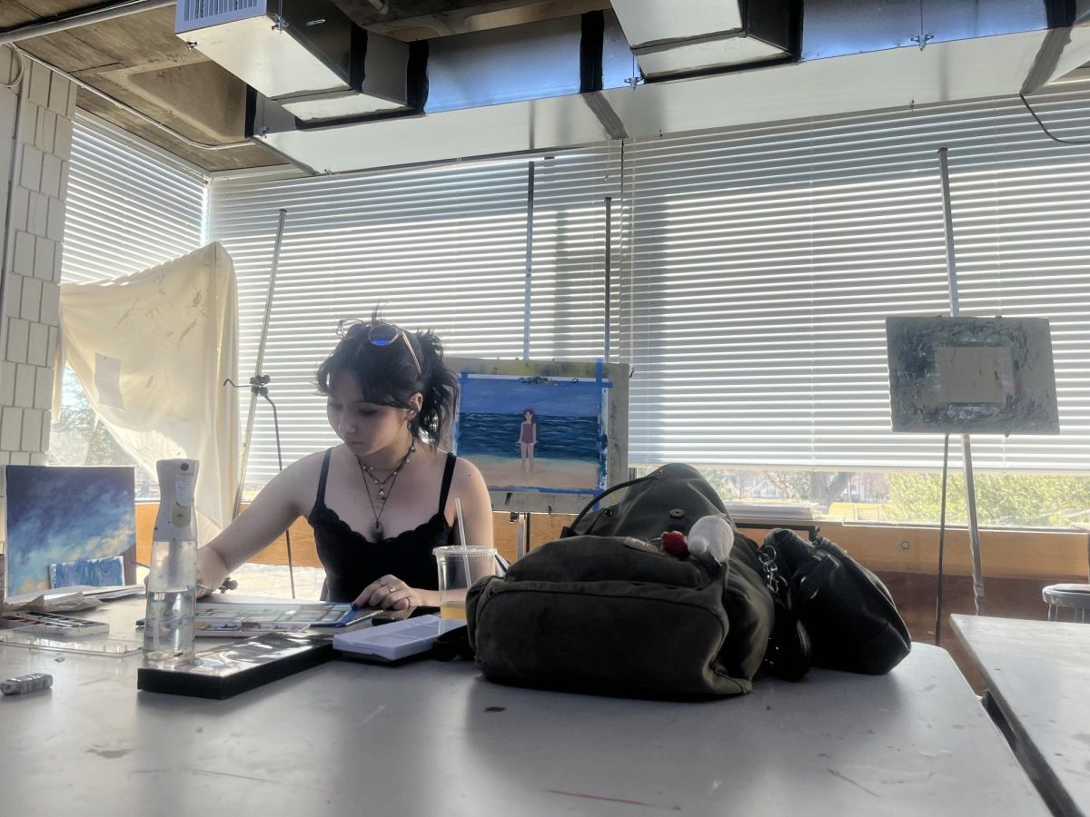 EXPERIMENTATION. Senior June Dalton finds that working in the advanced art classes at SPA has helped her try new things with her work: “[the class] definitely encourages you to explore mediums or sizes or any type of art that you may not have been comfortable with," Dalton said. 