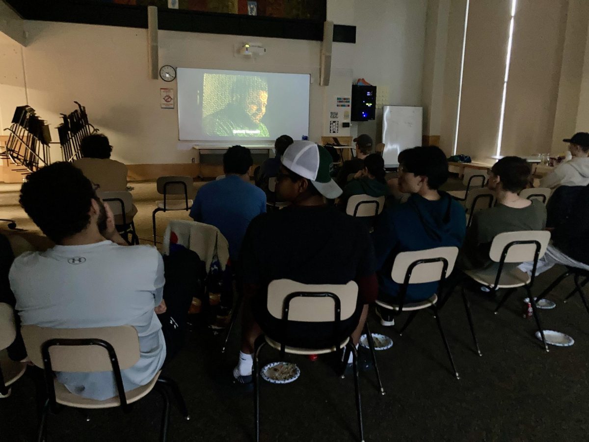 FULL HOUSE. Students watch "Mo" in Film Club.