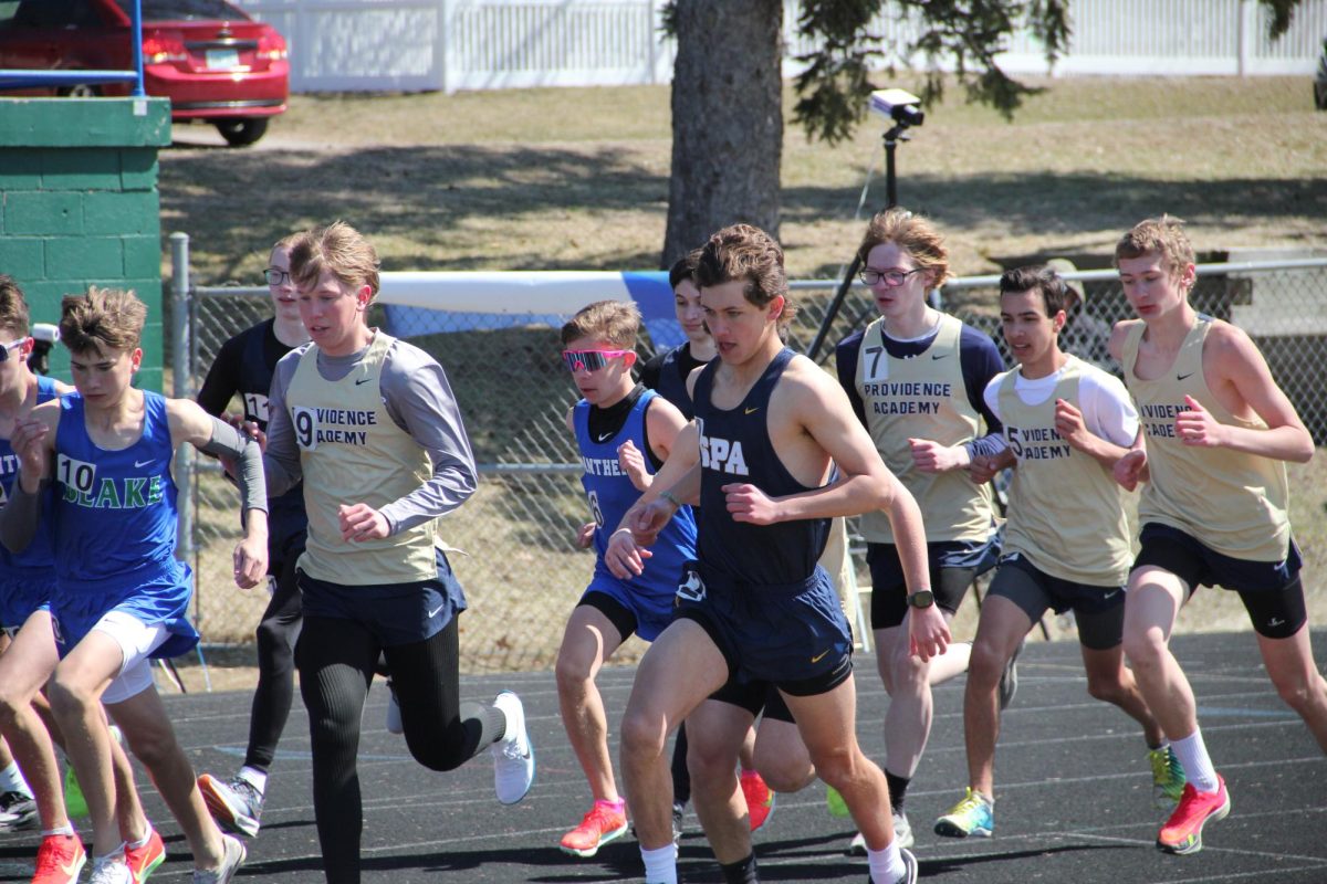 STRONG START. Runners from multiple schools kick off their mile run, looking to set personal records and crush the competition.