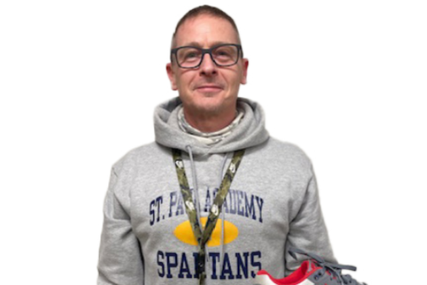 SNAZZY SHOES. College Counseling Administrative Assistant Carey Otto's passion for sneaker-collecting began when rising star Michael Jordan dropped the Air Jordan 1s in 1985. (Photo submitted by Carey Otto)