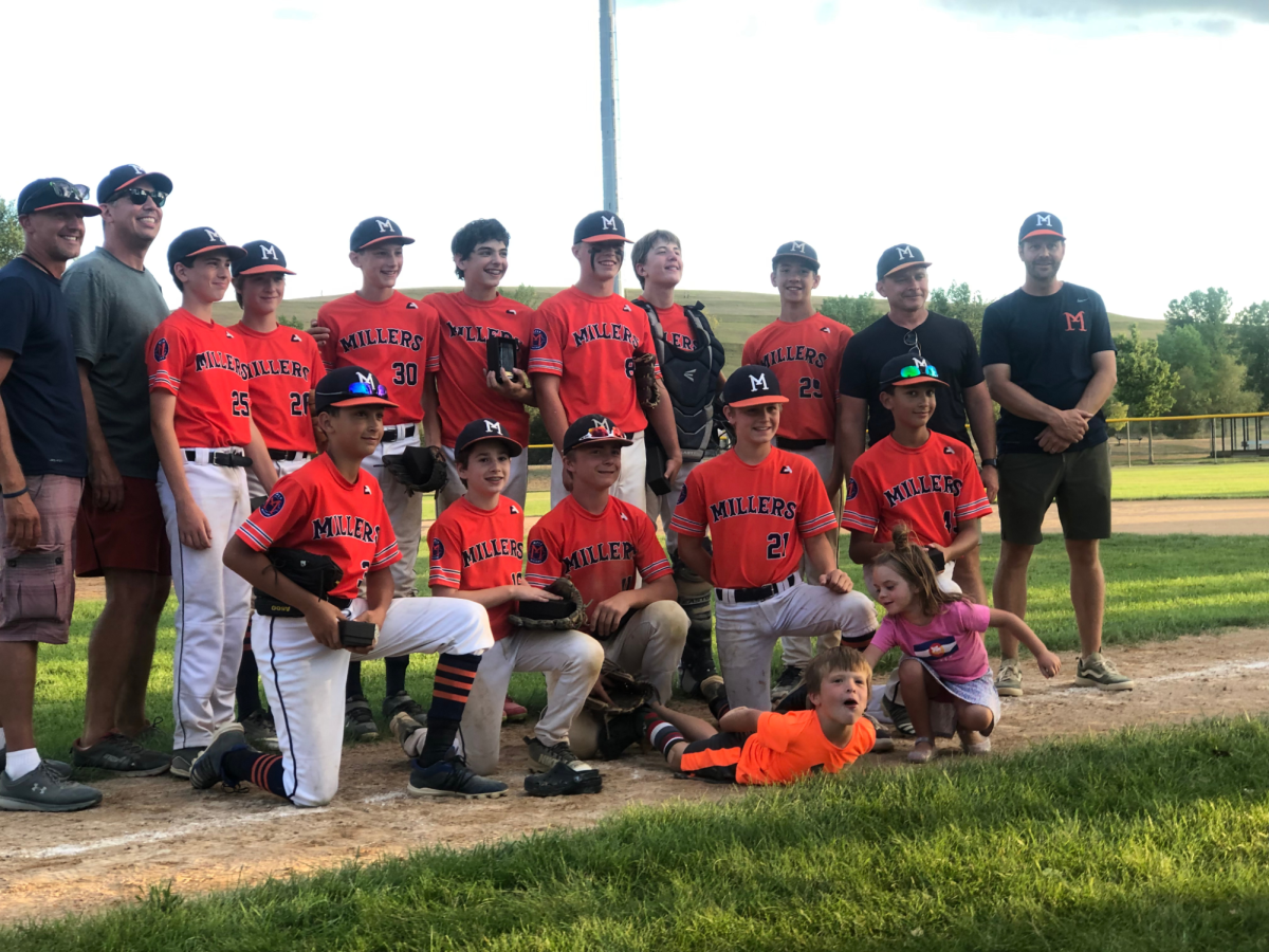 ACQUAINTANCE THROUGH BASEBALL. Sophomore Eddie Sofen and junior Cutler Crook met while playing on the Minneapolis Millers Youth Baseball team. Sofen and Crook are the only two not wearing hats in the top-middle row of the photo. (Photo submitted by Cutler Crook)