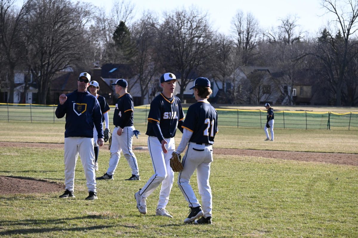 SWITCH UP. In the sixth inning, Grimsrud and Hembre switch off pitching.