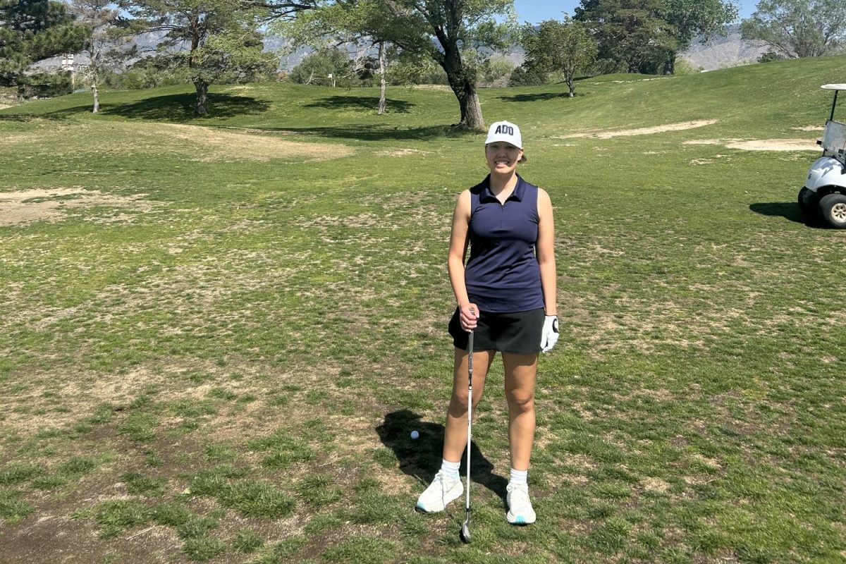 PERFECT HOLE IN ONE. Sophomore Stella Hunter enjoyed this trip in many ways from being surrounded by Indigenous culture to enjoying the beautiful weather of Albuquerque at Arroyo del Oak Golf Course. When describing what experiencing a powwow is like Hunter commented: “It's probably like any other, theater event. You have your spectators, and then you have like the main act, which is the dancing. Just be respectful, don't judge, because this is something that's very important to us. If you ever want to go to a powwow, you totally should. It doesn't matter if you're Native or not.” (Photo submitted by Stella Hunter)