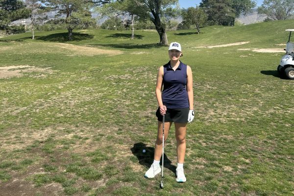 PERFECT HOLE IN ONE. Sophomore Stella Hunter enjoyed this trip in many ways from being surrounded by Indigenous culture to enjoying the beautiful weather of Albuquerque at Arroyo del Oak Golf Course. When describing what experiencing a powwow is like Hunter commented: “It's probably like any other, theater event. You have your spectators, and then you have like the main act, which is the dancing. Just be respectful, don't judge, because this is something that's very important to us. If you ever want to go to a powwow, you totally should. It doesn't matter if you're Native or not.” (Photo submitted by Stella Hunter)