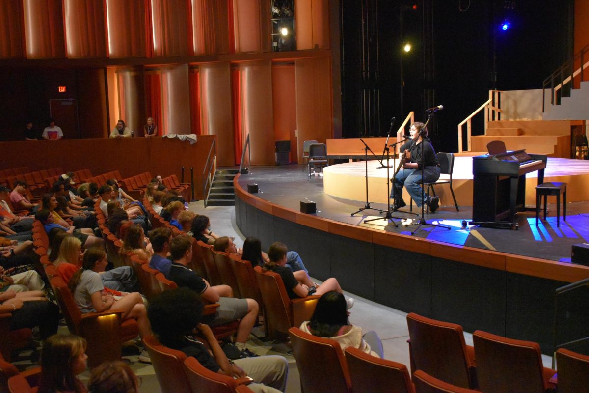 GIFTED GUITARIST. Junior Zahra Wiedmann masterfully performs Stick Season by Noah Kahan while playing the guitar.