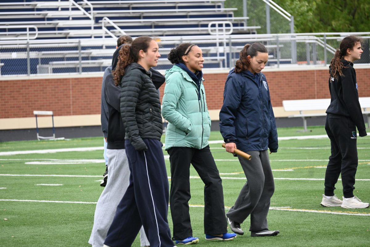 WARMUP. The 4x200 meter relay squad walk together amidst their warmup.