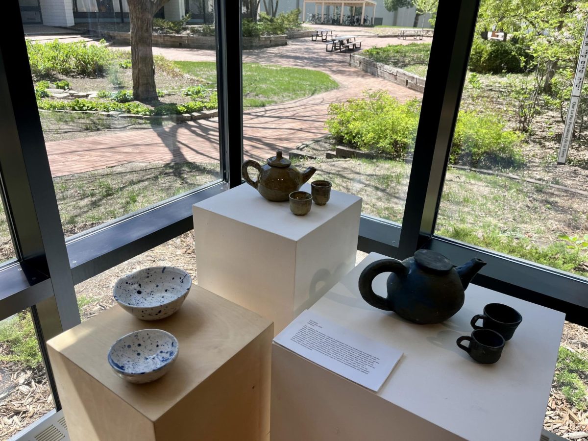 TEA TIME. Hoping to incorporate elements of both functionality and design, as well as to study how those two themes interact, Evy Sachs’s “Teapot Sets” were crafted with deliberate attention to detail in each one. Sachs experimented with size, shape, color and style through different glazes, sculpting techniques and lid sizes. Sophomore Eva Johnson, after viewing the gallery, was impressed: “Teapots are kind of known as one of the hardest things to make in ceramics, so I think that the construction is really impressive as well as the attention to detail,” Johnson said.