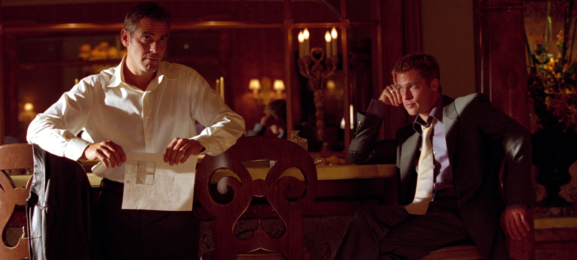 PIZZAZ. Two hours that fly by in an instant, it's the peak of Soderbergh's pizzazz-filled crime stories (Fair use image from Warner Bros.).
