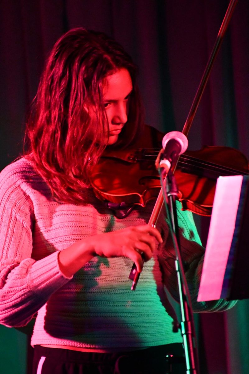 CLASSICS. Junior Naomi Glozman plays the violin in a duet, performing Camille Saint-Saents' "Danse Macabre."