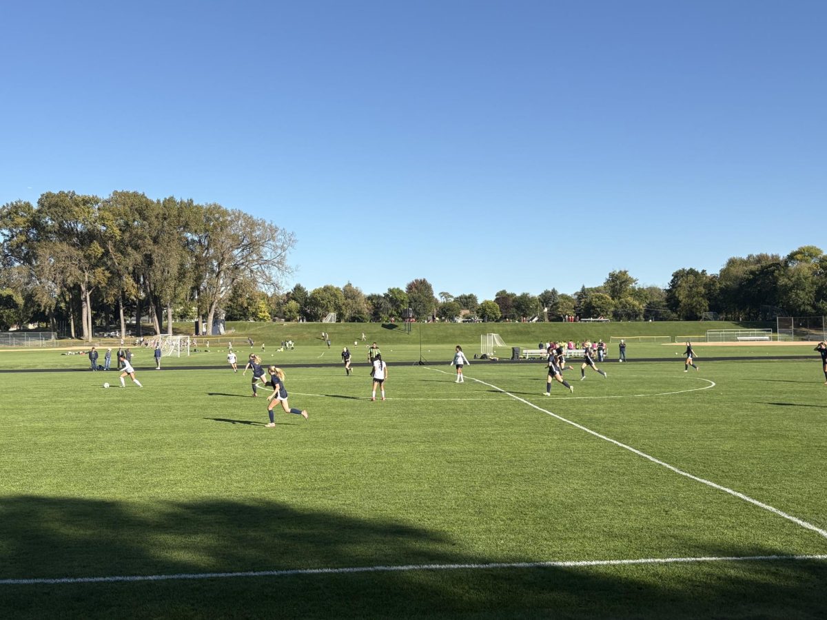 ON THE RUN. The Spartans make a forward brace trying to regain control of the ball.