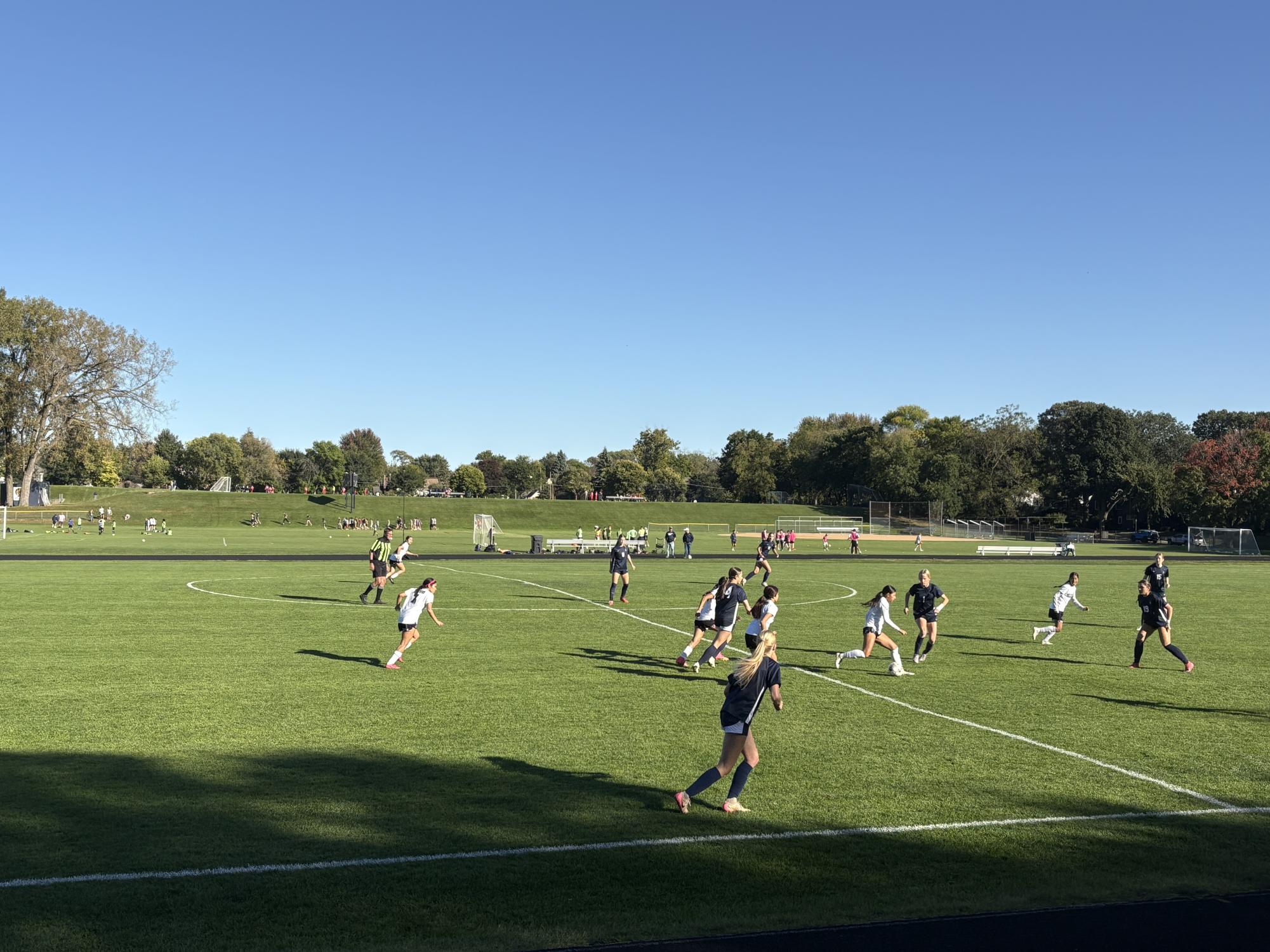 FIELD VISION. Maggie Sampsell Jones looks for the ball and plans her next move.