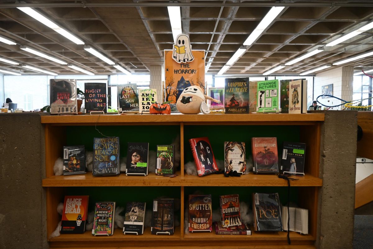 DISTINCTIVE DISPLAYS. The librarians work extra hard to ensure representation of cultures, heritage and identity each month with displays, on high-interest topics that encourage reading. The Halloween display is one examples including books by native, nonbinary, POC and international authors as well as books adapted into films and television. 