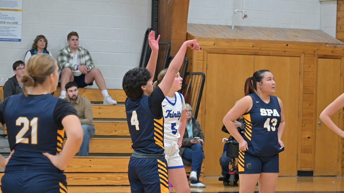 BUCKETS. Senior Devi Nelson shoots a free throw. 