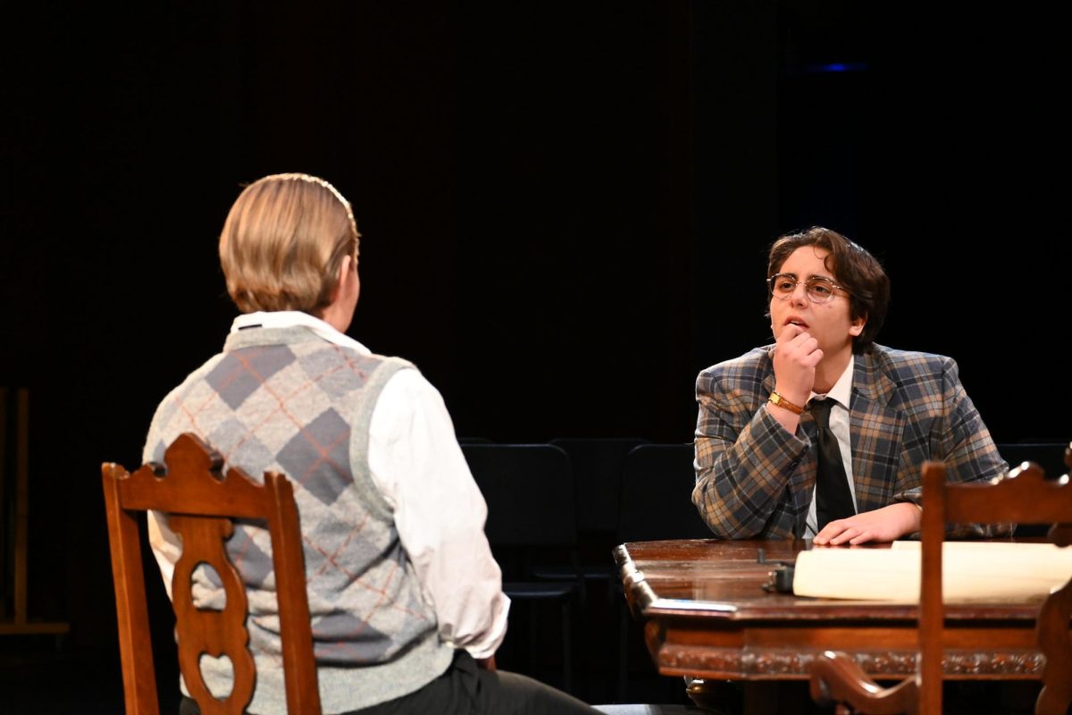 HONED IN. 12th grader 
Zahra Wiedmann intensely converses with 
Tressyn Weiss over the dinner table.