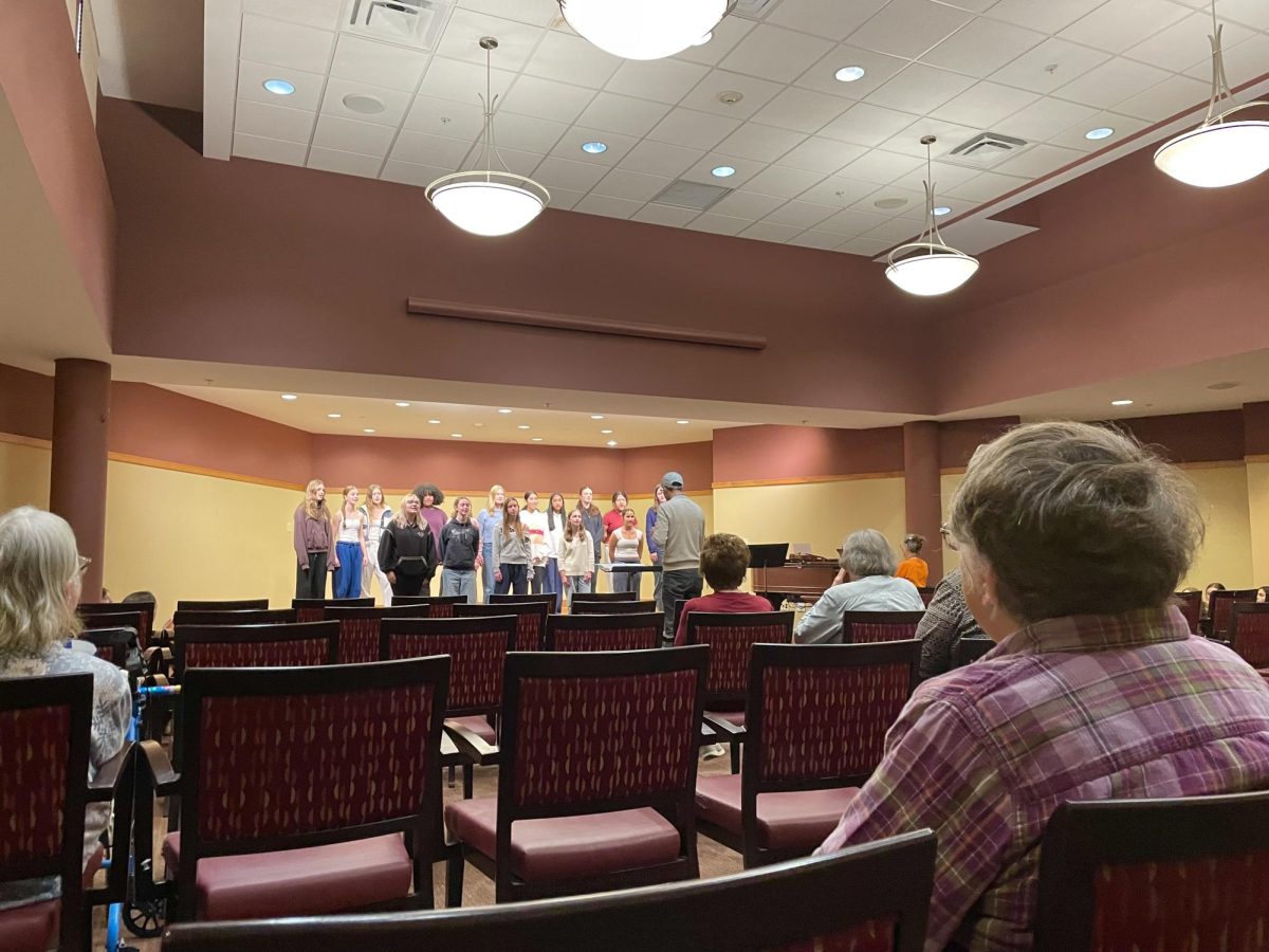 SUMMIT STARTS. Summit singers go first and sing a few of their songs that they will perform at the Upper School Pops Concert. The concert will take place on December 5th and 6th at SPA's Huss Center.