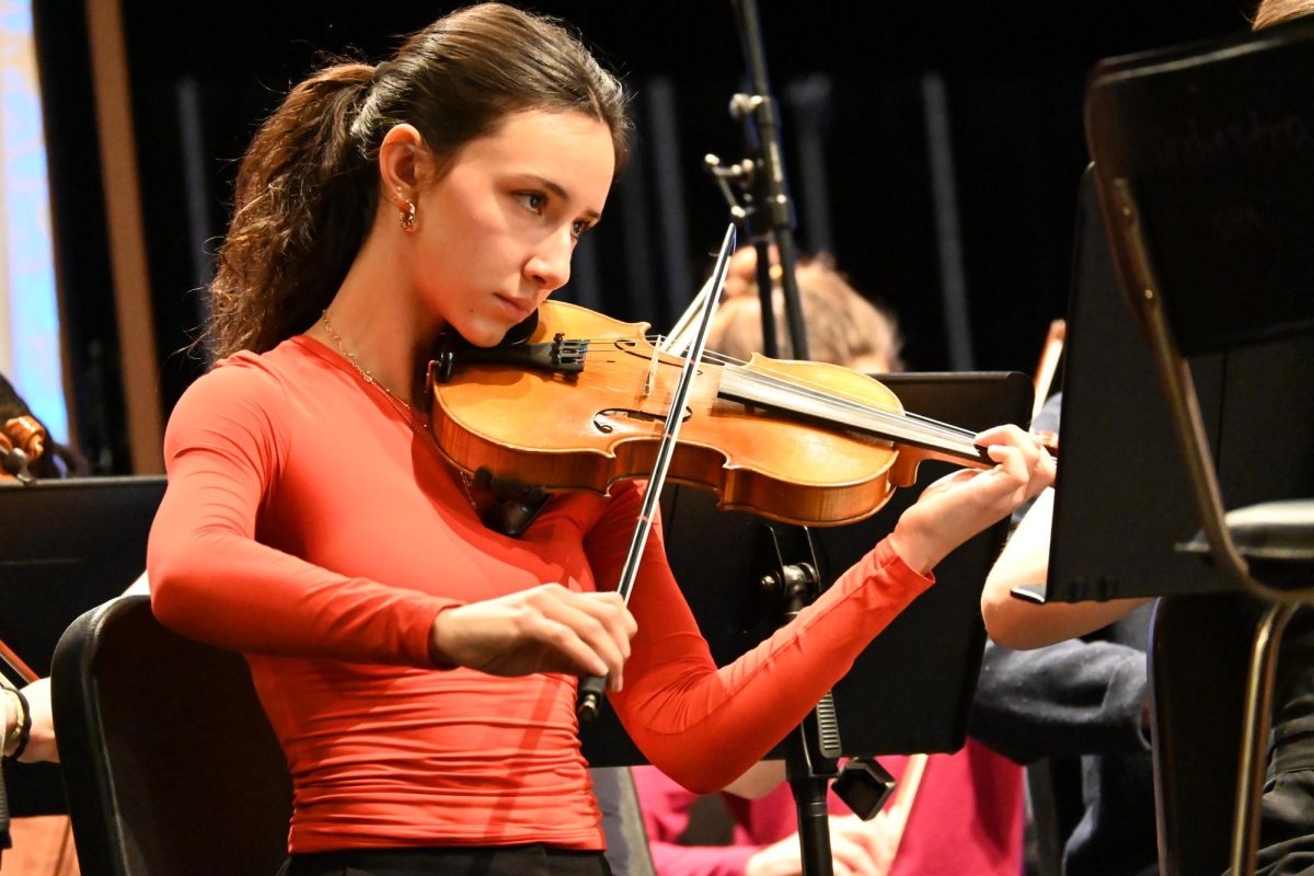 CONCERT MISSRESS. After intermission on the first day, concert mistresses Maeve Duncan and Paloma Gomez Whitney switch. Whitney sits in first chair for "Skyfall." 
