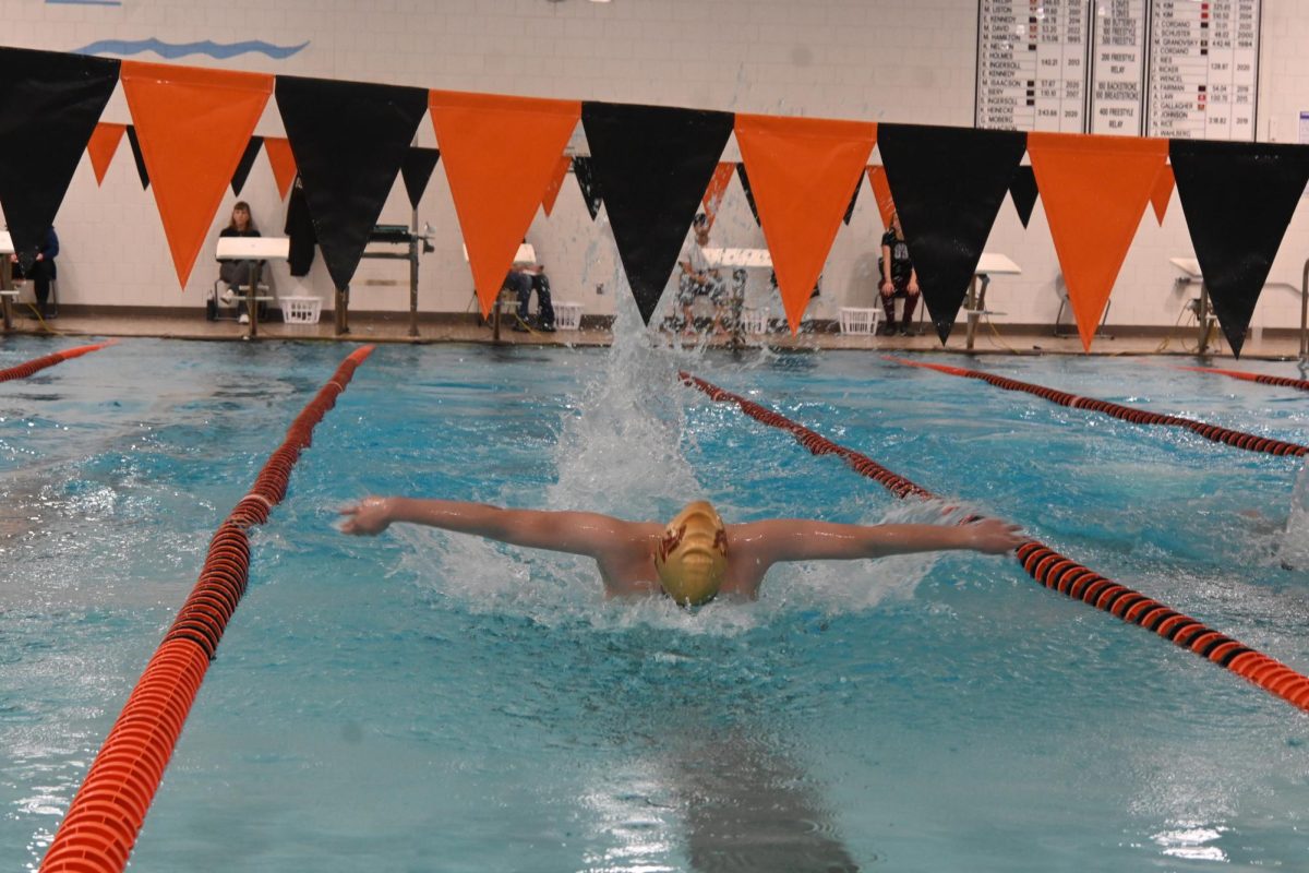FLYING HIGH. Kaya Cayci in the midst of 100-yard butterfly race. "The 100-yard fly is a very typical event for me" he said.
