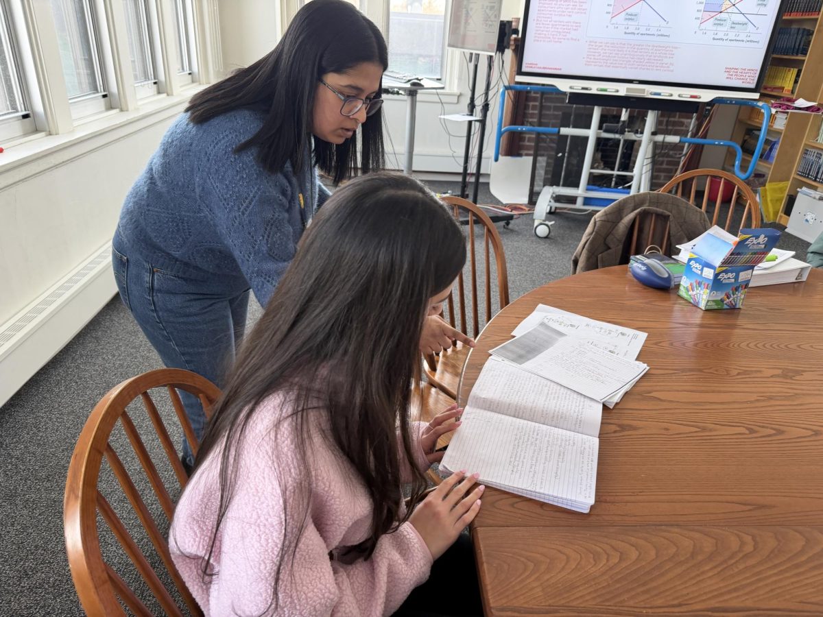 WORK TOGETHER. Dr. Venkat offers help to Kavita Deo. They talked about their problem sets.