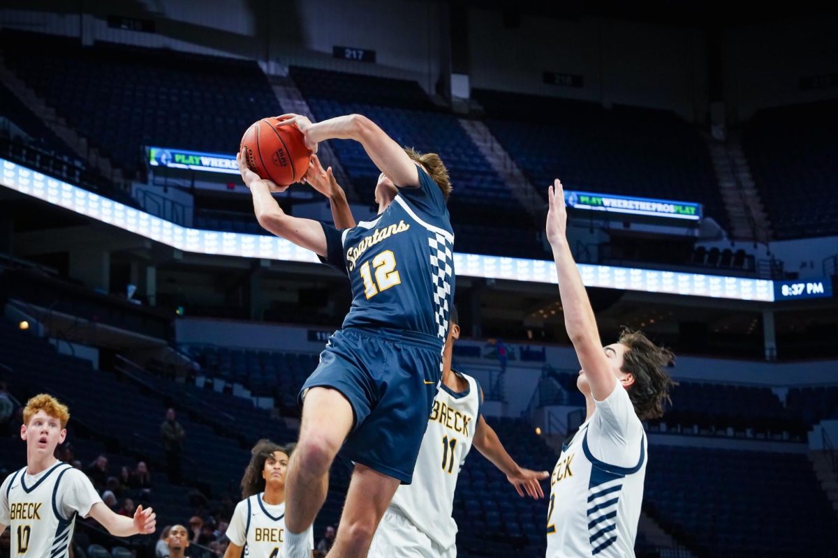 JUMP. Vogenthaler gets height while going in for a layup.