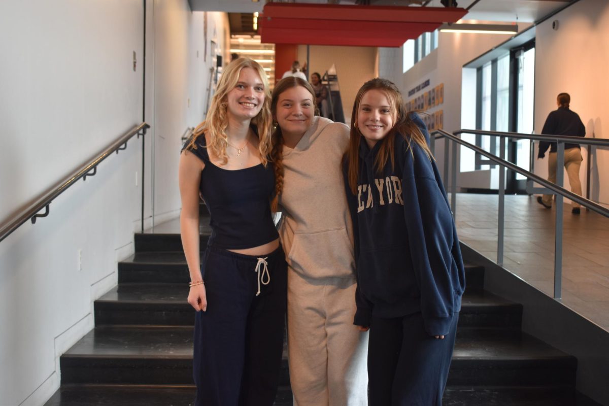 BEST FRIENDS. Sophomores Lucy Byrnes, Fiona Lambert, and Addy Peterson wore navy blue and gray.