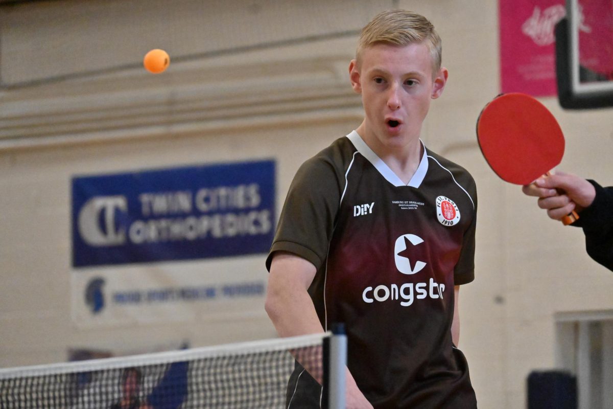 EYES ON. Junior Caden Deardurff watches an incoming ping-pong ball. 