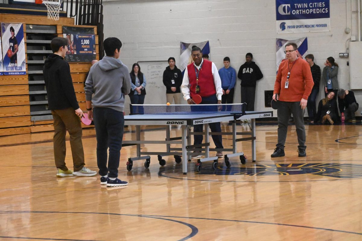 PING PONG FINALS. The sophomore duo face off against Dr. Ottley and Dr. Hovan. The sophomores won 11-5 to be crowned champions of the ping pong tournament. 