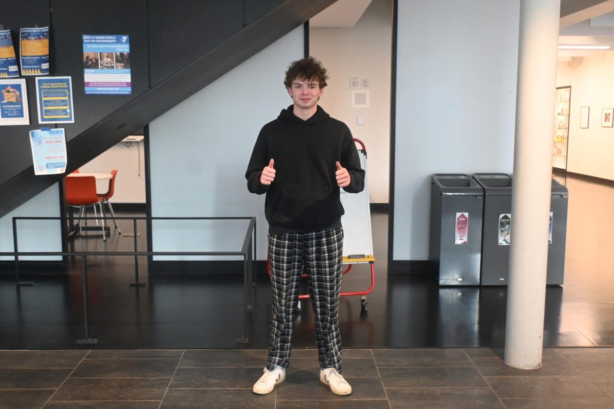 PLAID PANTS. Senior Elliot Sjaastad wears plaid pants for pj day. 