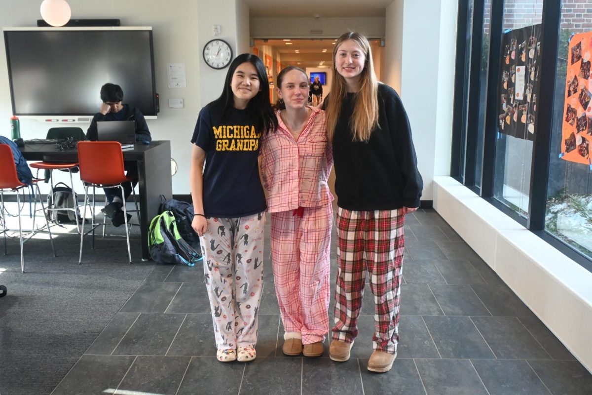FRIENDS IN PJS. Seniors Elizabeth Tuttle, Lilly Spurgeon and Carys Hsiung all wear pajamas.  