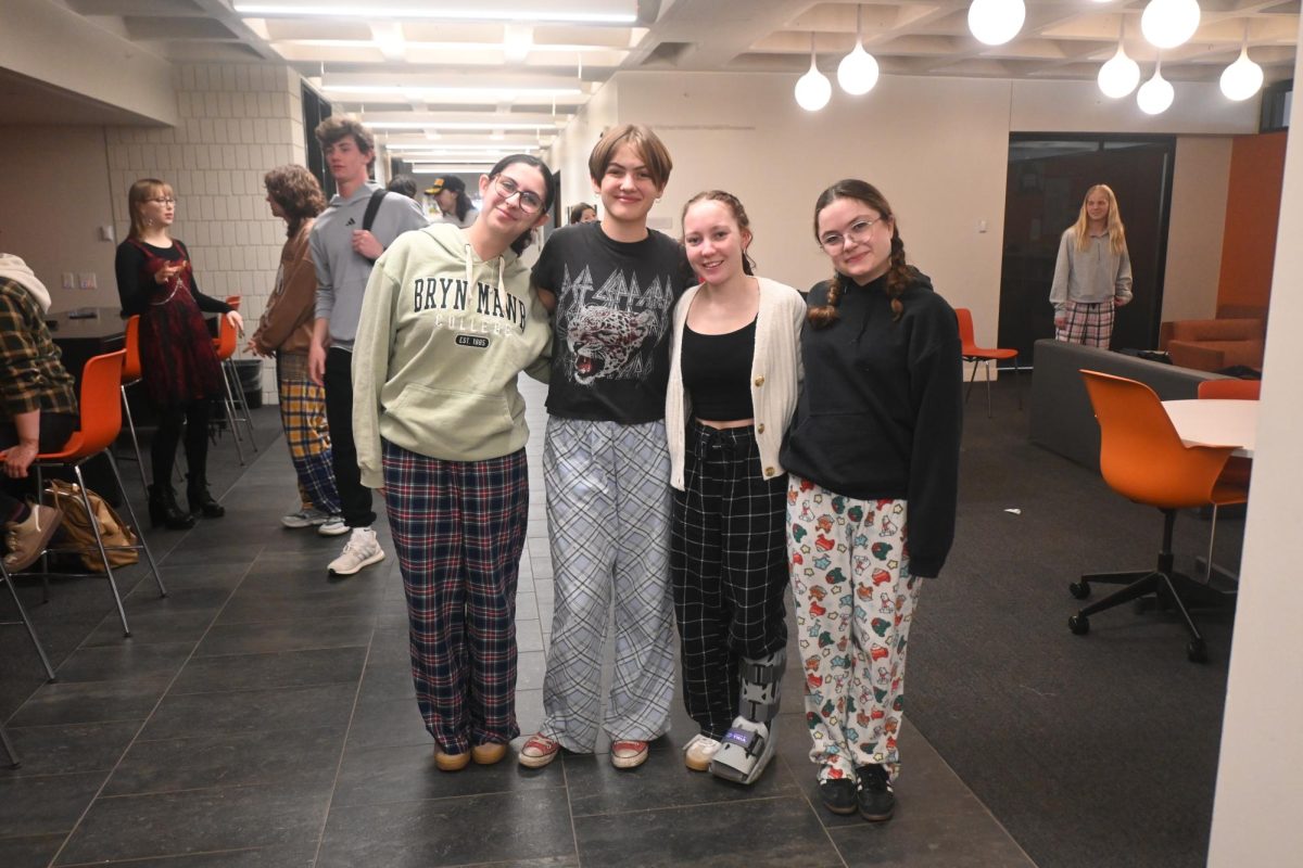 PAJAMA PANTS. Seniors Elzie Bieganek, Beatrix Rhone and junior Anneli Wilson all wear fun pants for pajama day. 