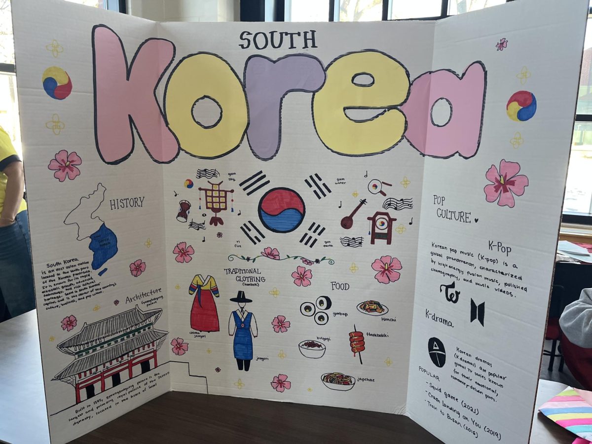 SOUTH KOREA. The South Korea stall featured a beautiful poster as well as traditional candies for middle schoolers to snack on while they moved across the cafeteria.