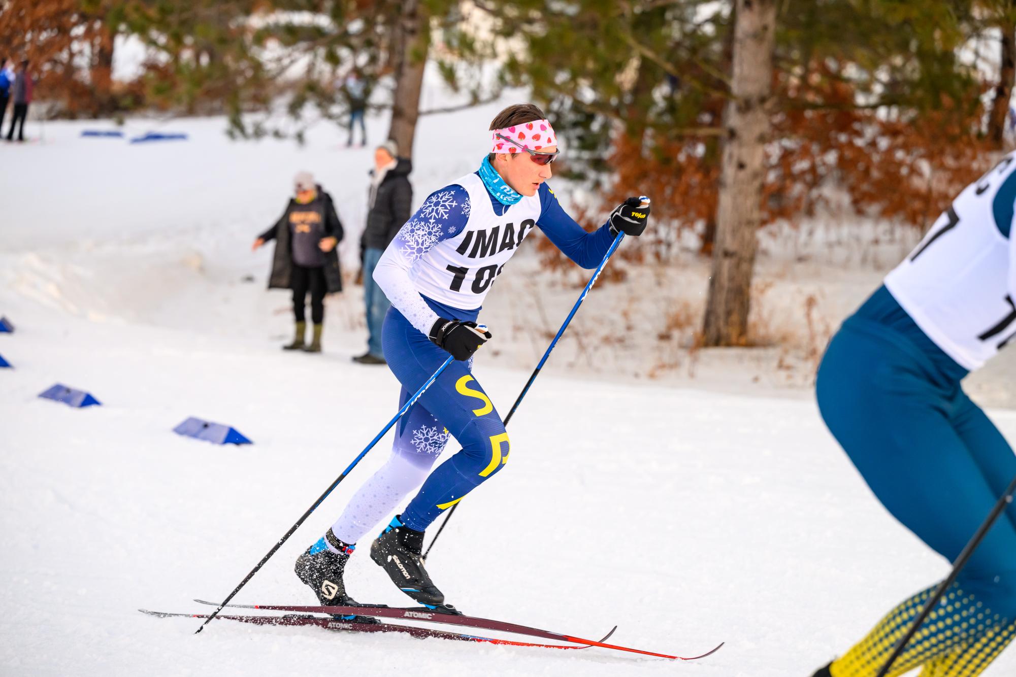 Sophomore Darien Hull skies down the slopes in a Nordic race.