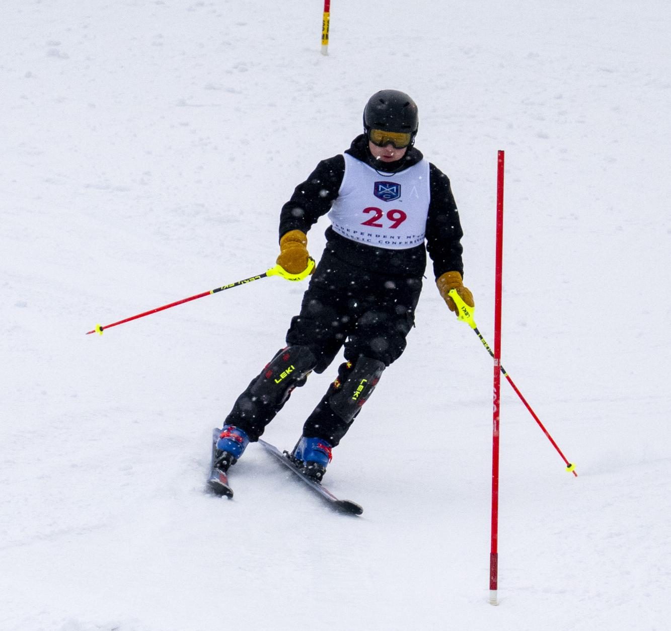 Ninth-grader Anthony Lynch downhill skies the hill during a Alpine meet. 