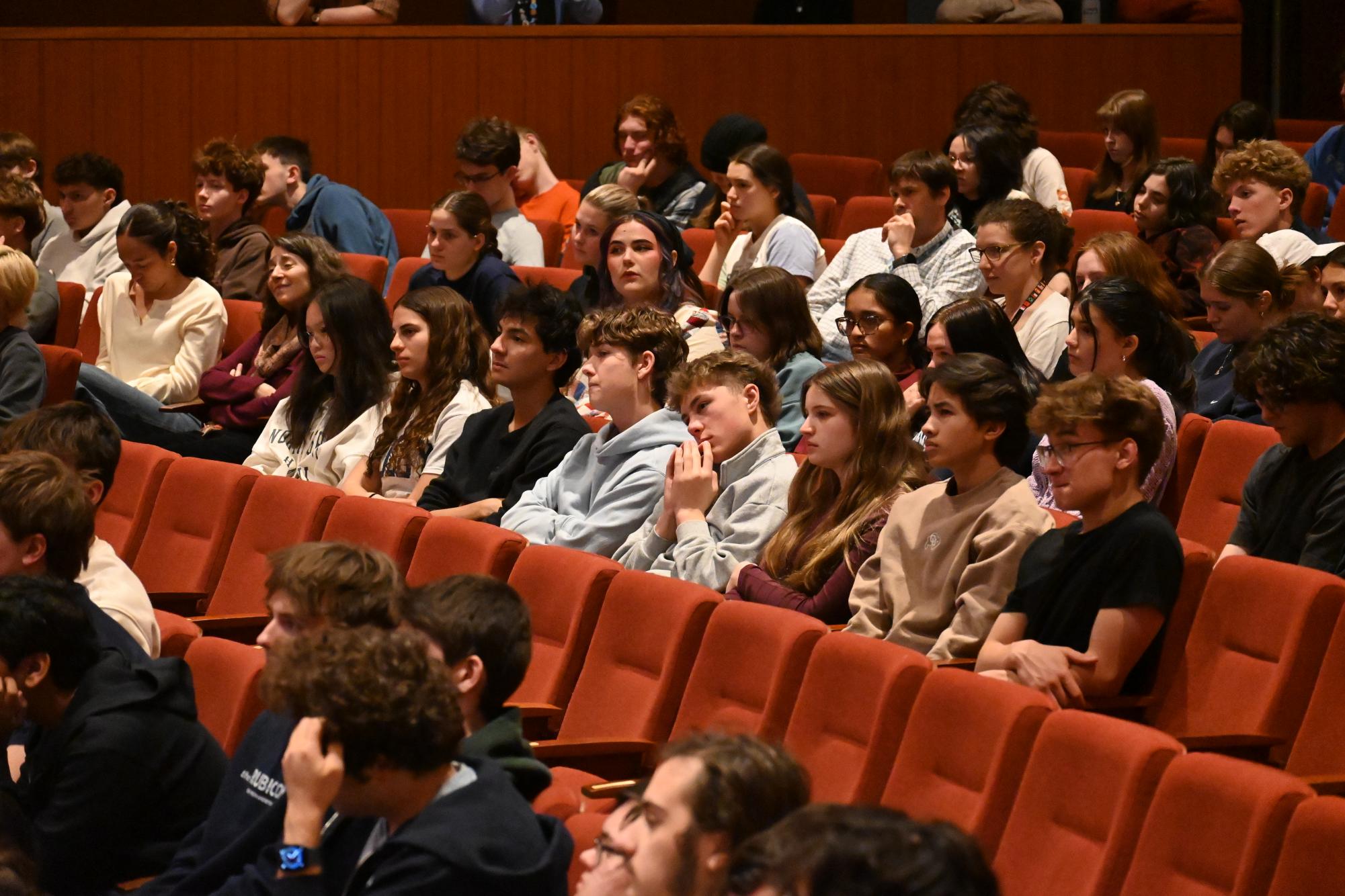 PANEL-FOCUSED. The Shulow advisory of juniors sit together and listens to the panel speak.