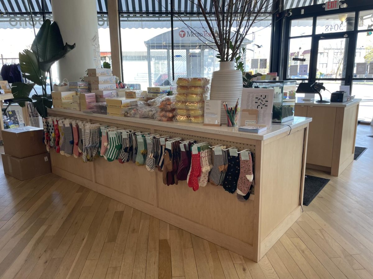 MAJOR SOCK-CESS. The sock wall behind the cash register yields 
