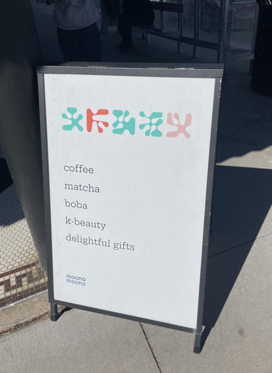 SNEAK PEEK. The sign outside the front door lists a few of many intriguing things inside.