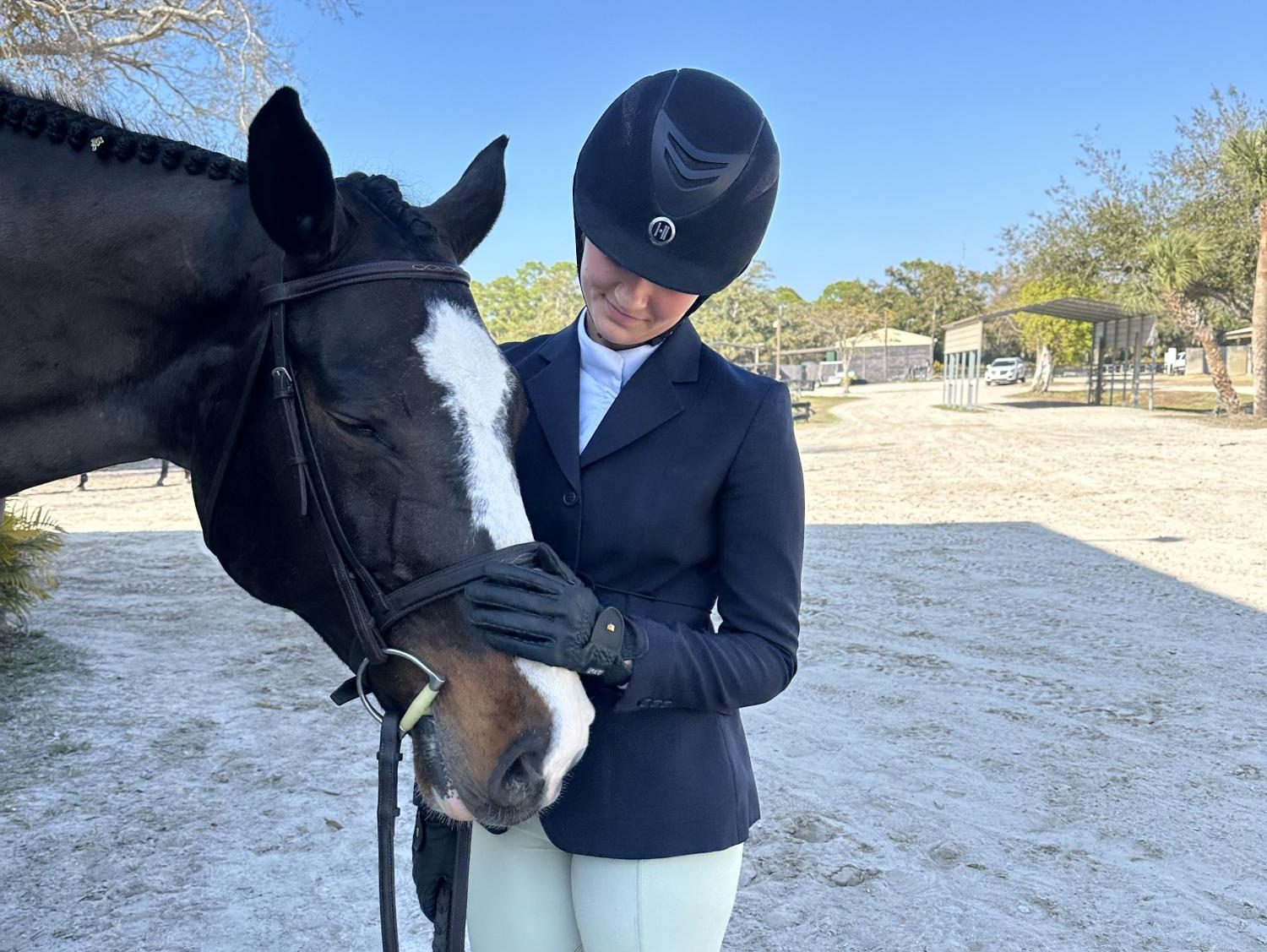 CARING. Elle Williams taking care of her horse at her barn in Grant, Minnesota. 
(Submitted by Elle Williams)