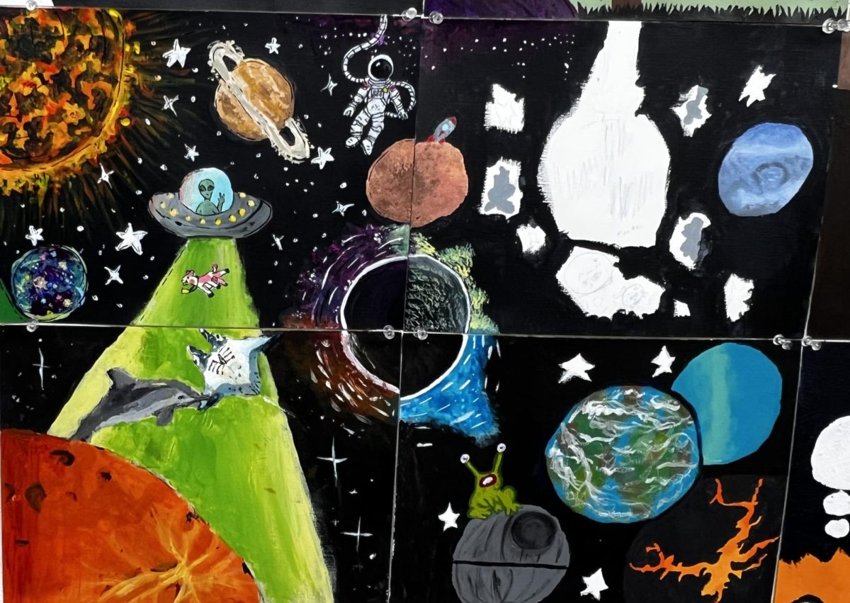 Four student's collaborated well and formed a space theme.